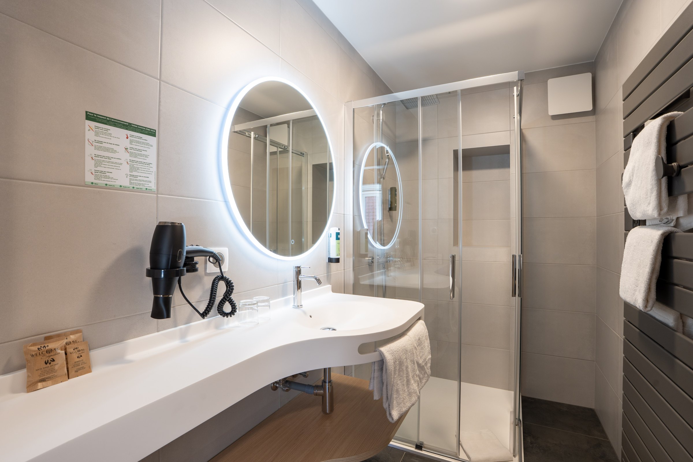 Bathroom mirror and glass shower