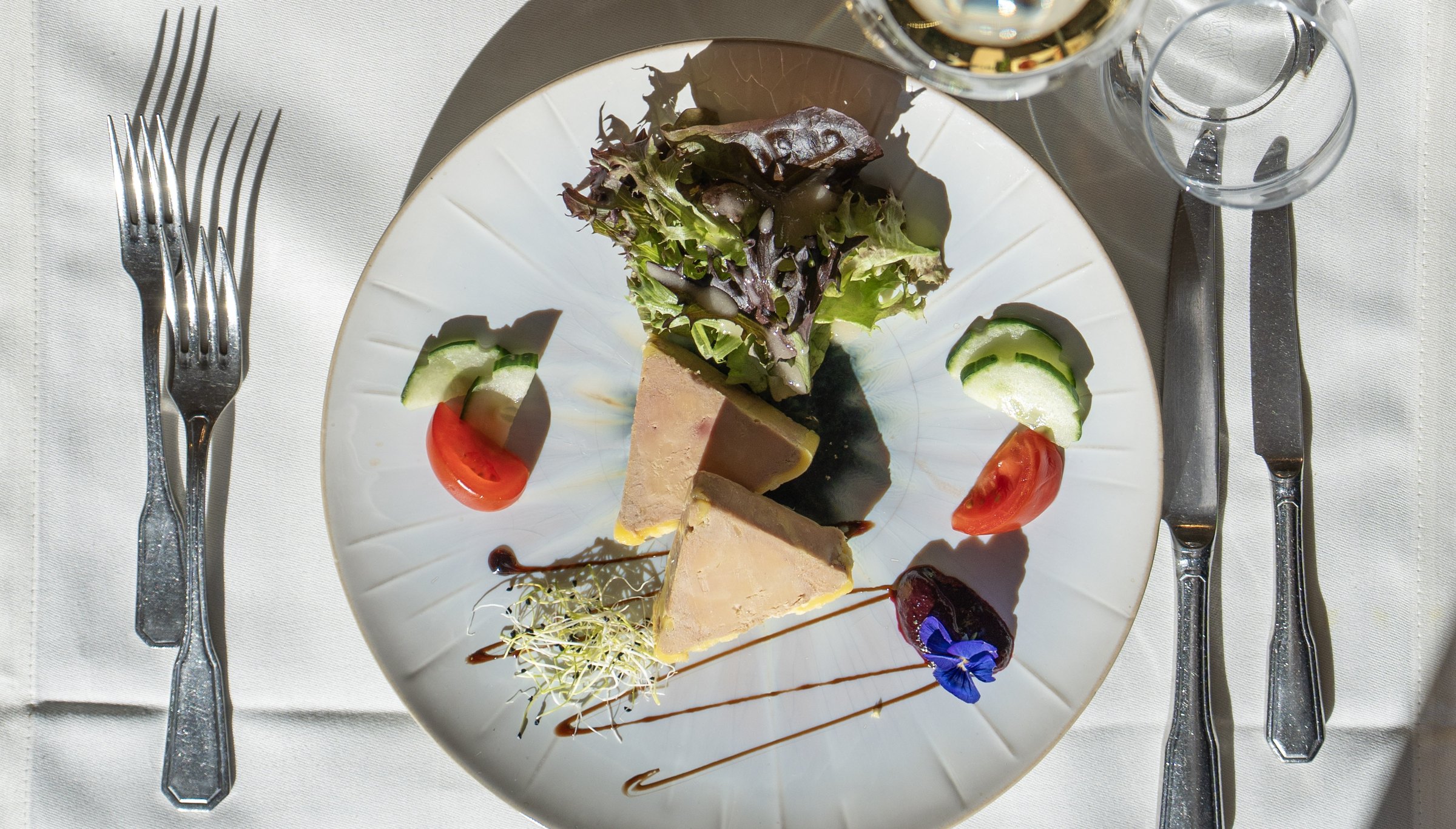Foie gras starter served with salad