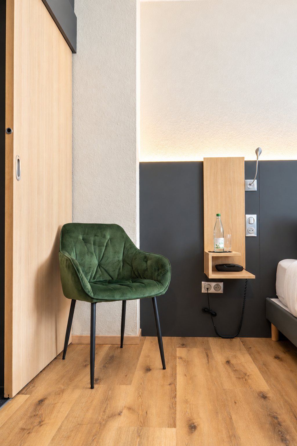 Reading corner with green armchair