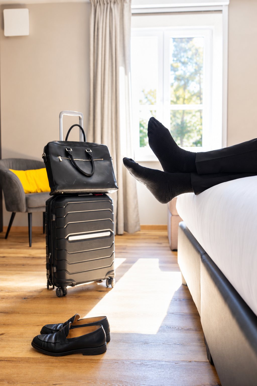 Relaxing in the junior suite, suitcase by the window