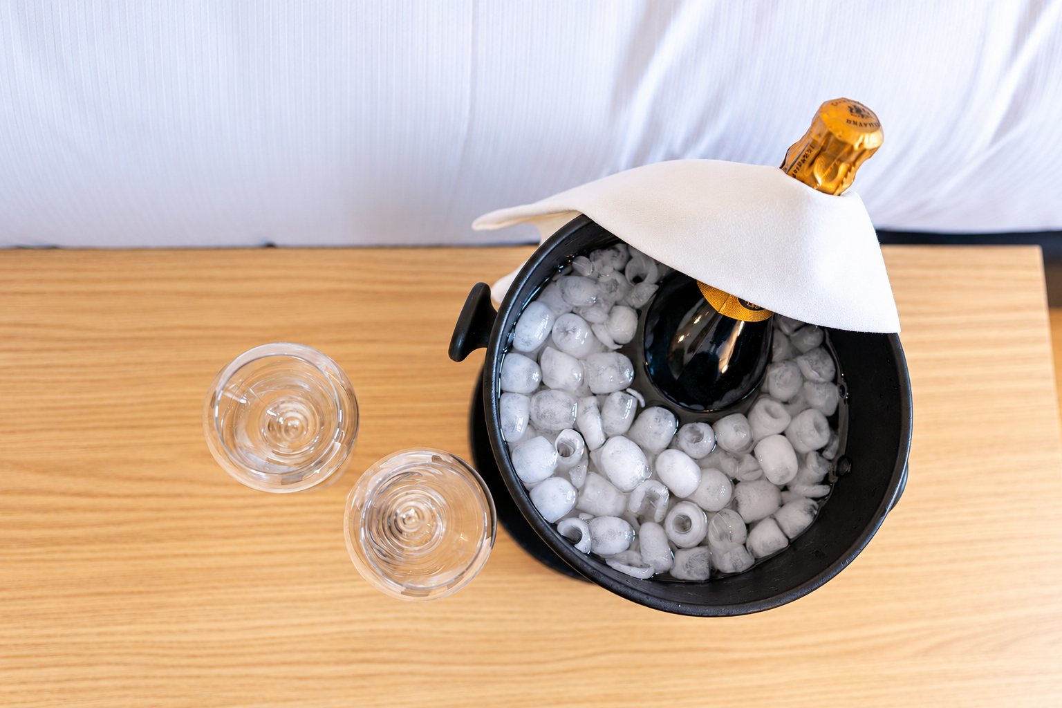 Ice bucket and flutes seen from above